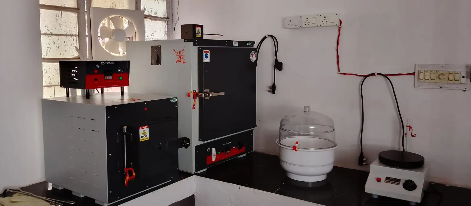 Muffle furnace, hot air oven, desiccator and hot plate in the Chittor Test House laboratory