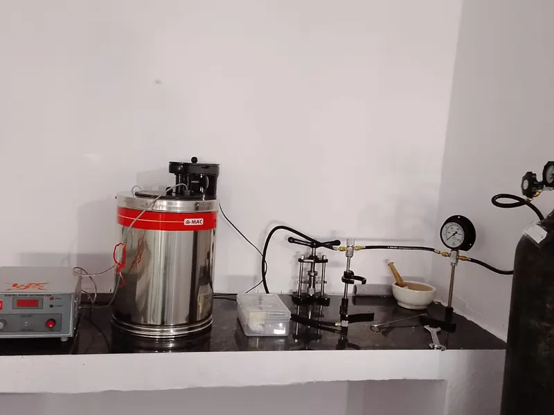 Bomb calorimeter with oxygen cylinder used to determine gross calorific value of coal